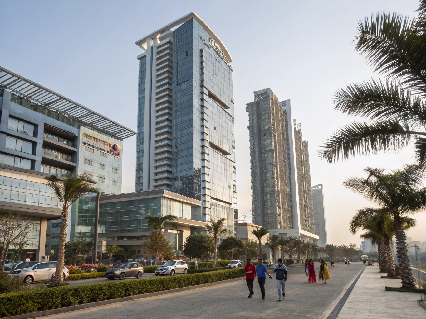 Modern glass architecture reflecting the Bengaluru skyline